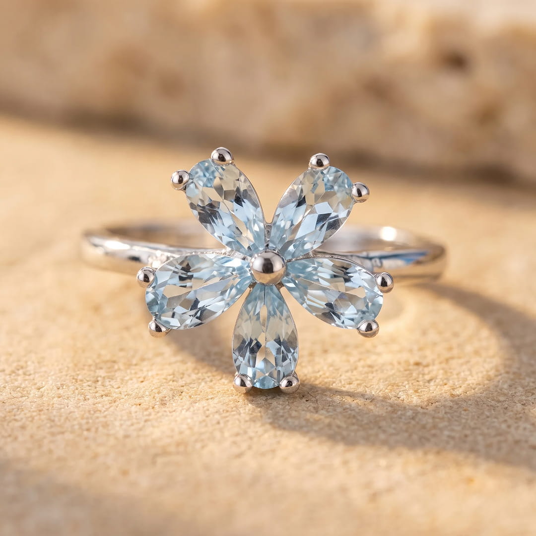 "Flower of Light" Ring in Blue Topaz