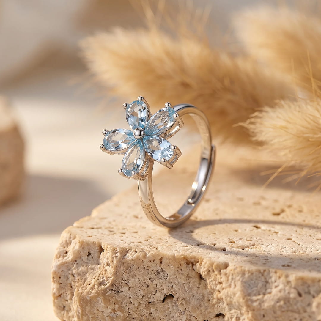 "Flower of Light" Ring in Blue Topaz